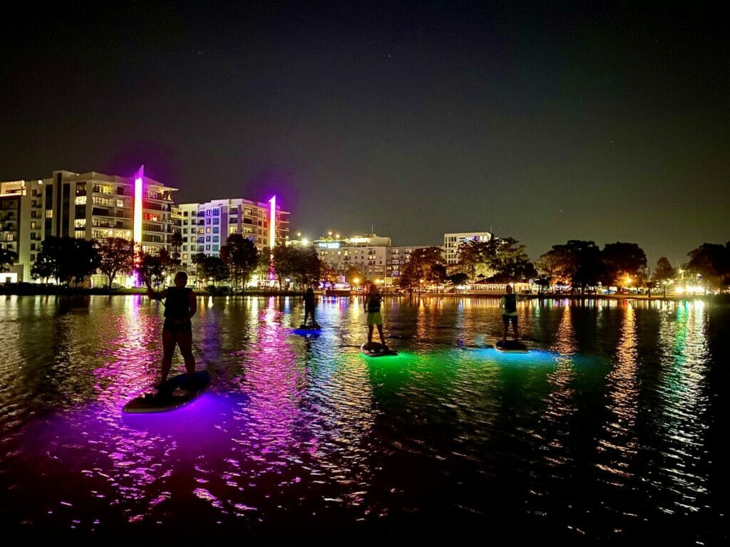 Colorful Neon Night Glow Paddleboarding Tour on Lake Ivanhoe